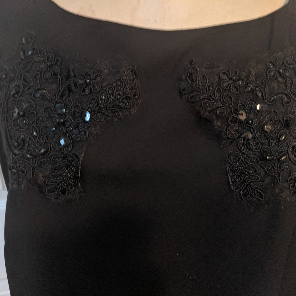 Beautiful black sleeveless blouse w/sequence detai